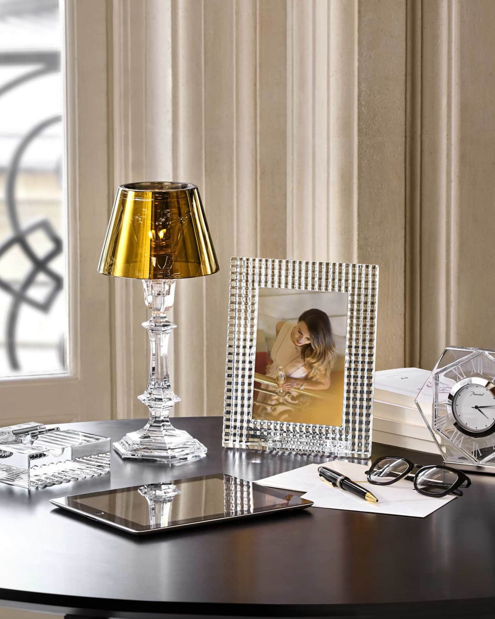 Candle holder with shade outlet
