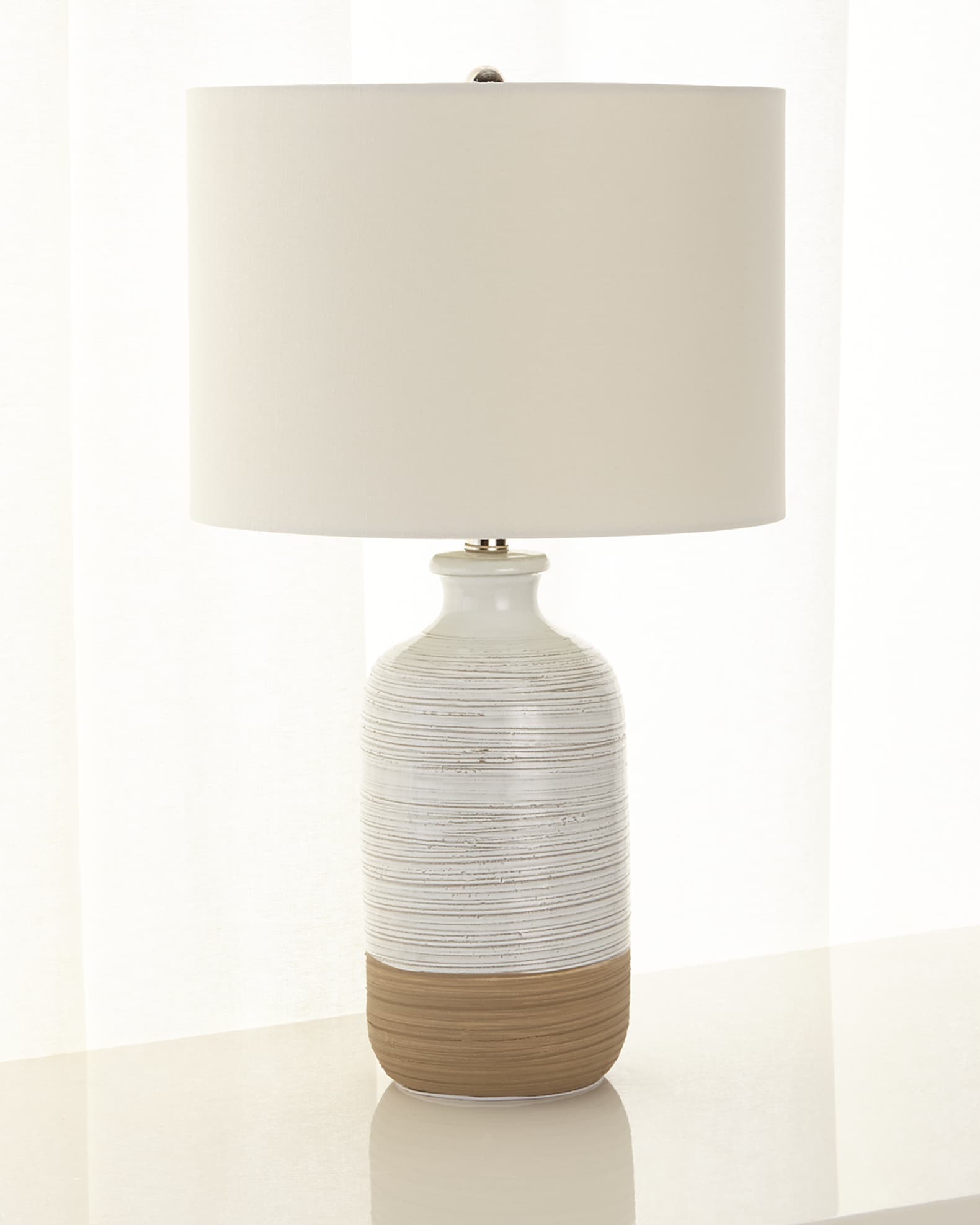 Glow by new arrivals jamie young lamp