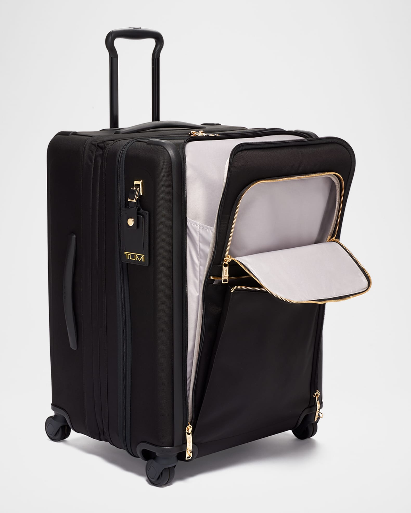 Tumi black and gold luggage hotsell