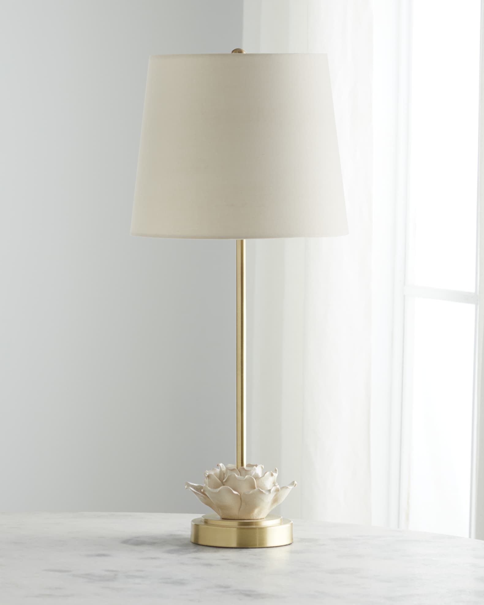 White ceramic lamp with flower outlet on base