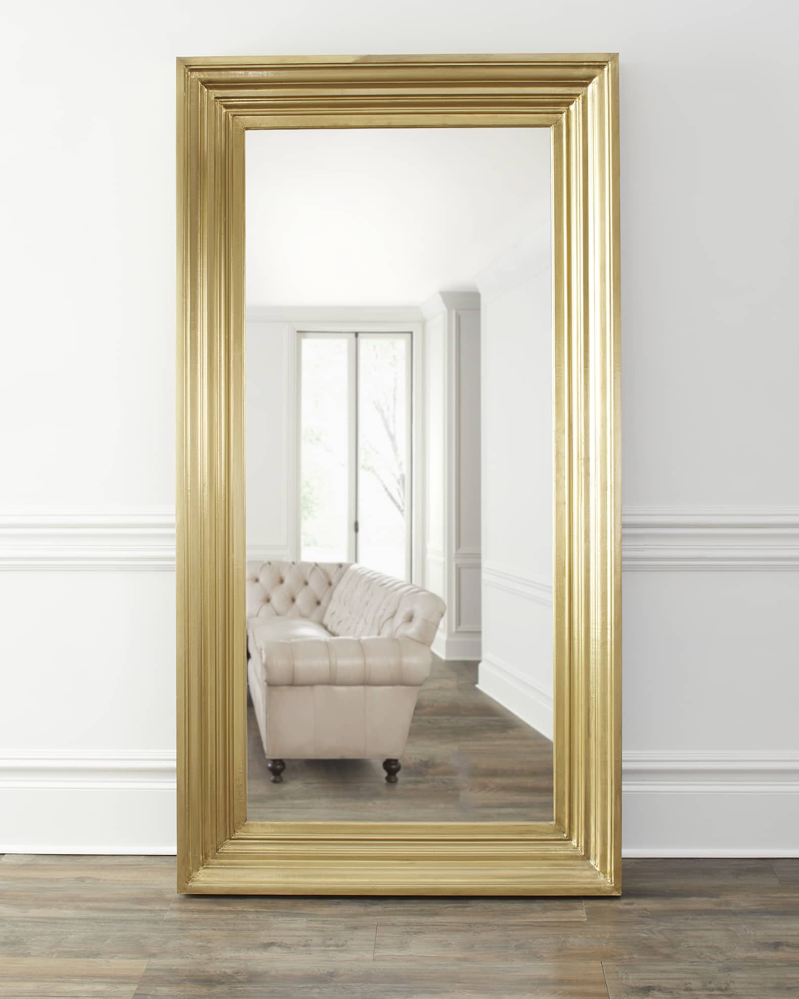 Brass floor best sale mirror
