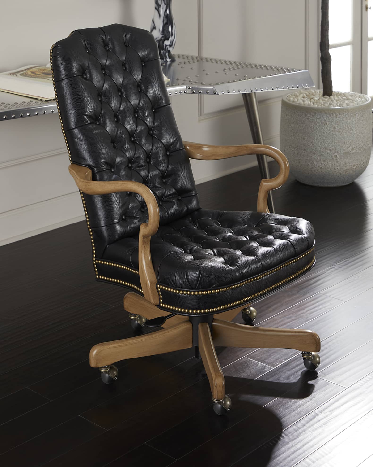 Black leather tufted office chair top