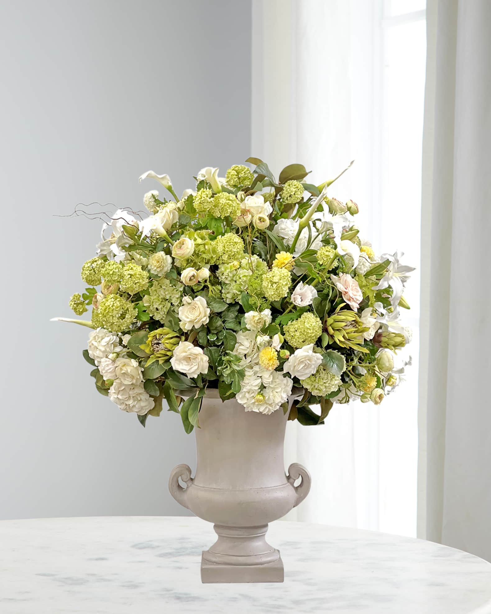 Artificial flower arrangements for the discount home